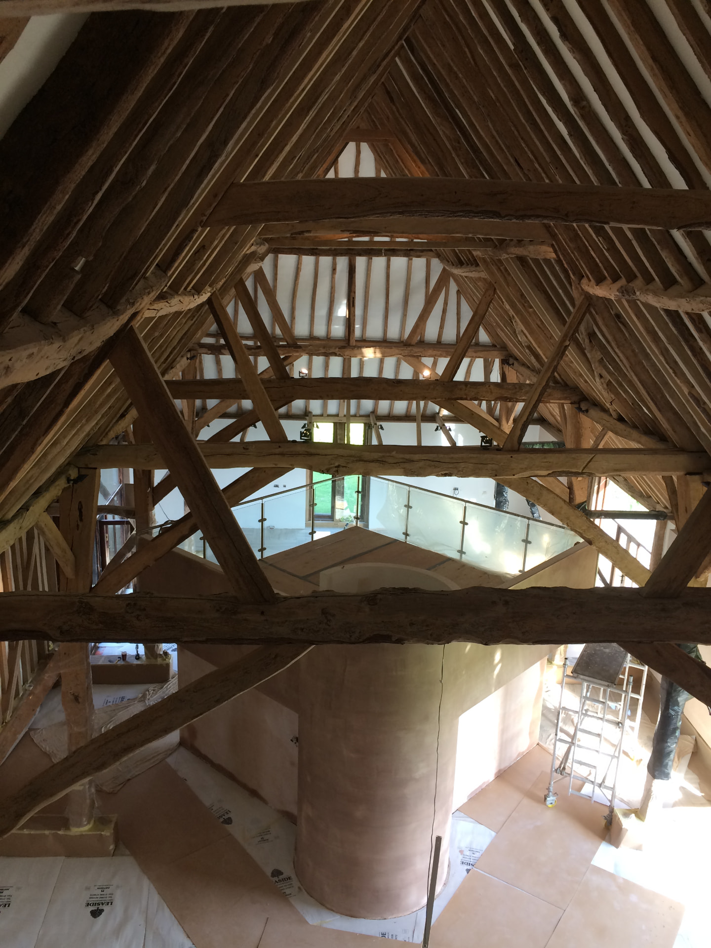 Restored oak timber frame and roof structure inside a period barn conversion